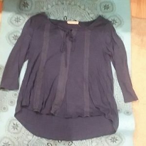 A woman's medium sleeved shirt